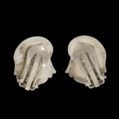 Lot 69 - Georg Jensen, a pair of mid 20th century moonstone flower clip-on earrings