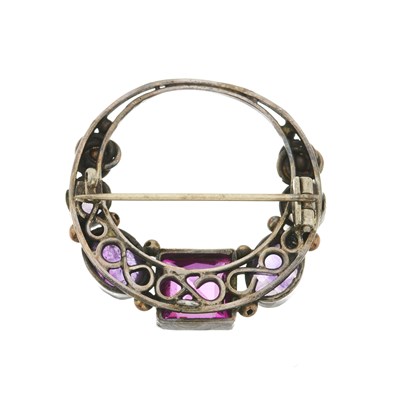 Lot 73 - An Arts and Crafts silver amethyst and synthetic ruby brooch