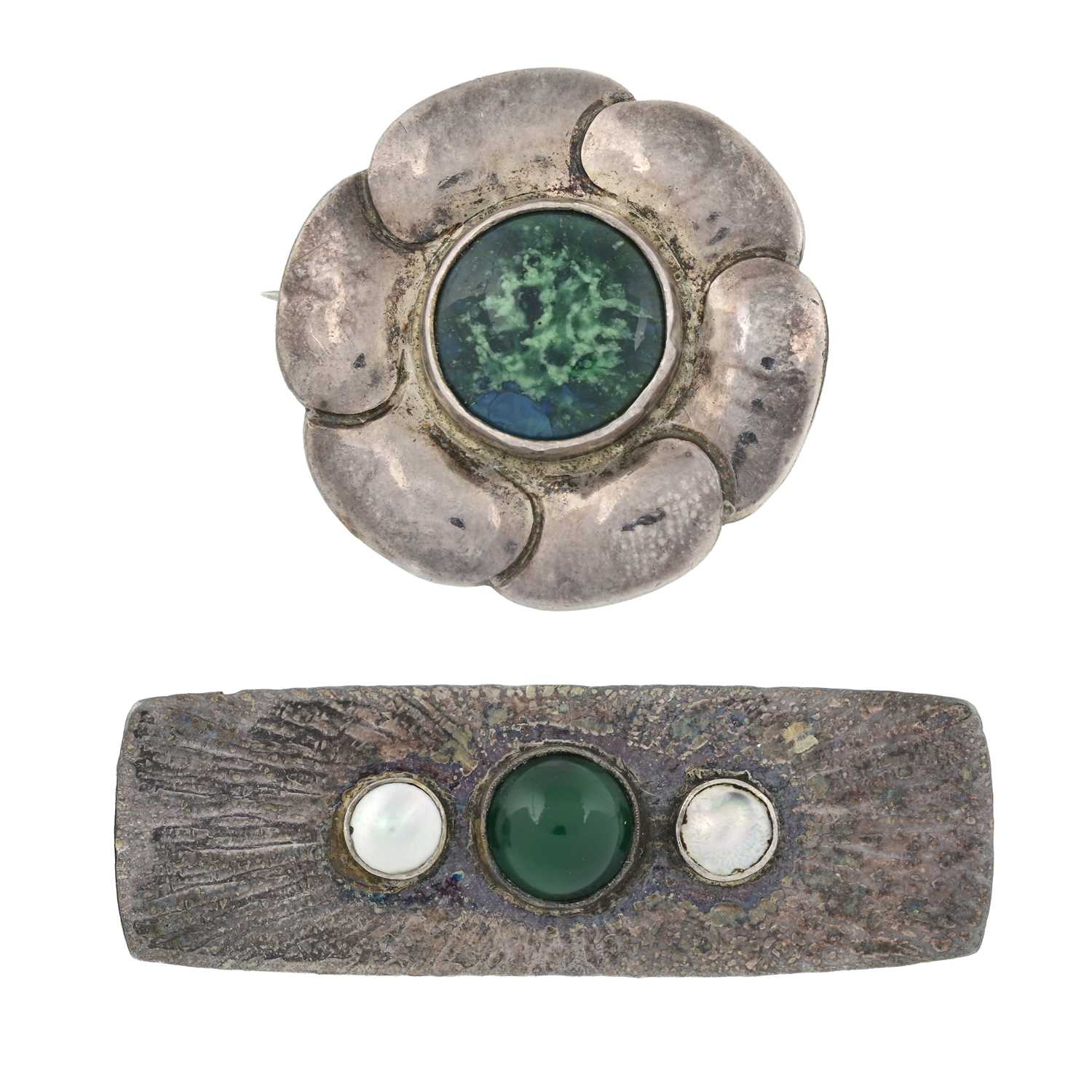 Lot 10 - Two Arts & Crafts silver gem set brooches