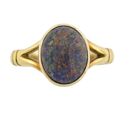 Lot 563 - A treated opal single stone ring
