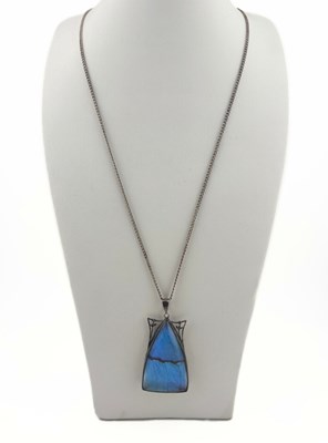 Lot 518 - A mid 20th century butterfly wing pendant, with curb-link chain necklace