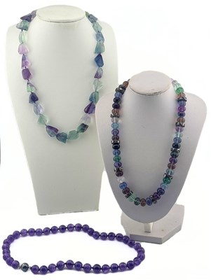 Lot 591 - Three fluorite and amethyst bead necklaces