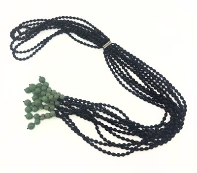 Lot 572 - An aventurine quartz and black paste bead scarf style necklace