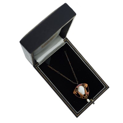 Lot 77 - Archibald Knox for Liberty, an Arts & Crafts gold blister pearl pendant necklace