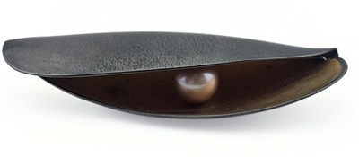 Lot 459 - A bicolour abstract brooch with free moving cultured pearl inside