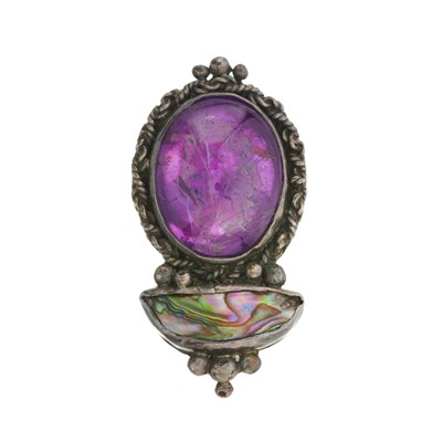 Lot 72 - Mary Thew, an early 20th century Scottish silver foil-back amethyst and mother-of-pearl brooch