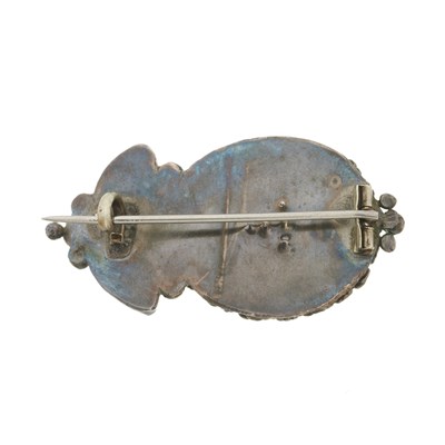 Lot 72 - Mary Thew, an early 20th century Scottish silver foil-back amethyst and mother-of-pearl brooch