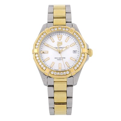 Lot 266 - Tag Heuer, a bi-colour Aquaracer bracelet watch