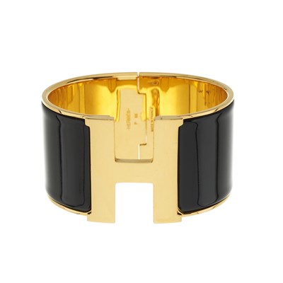 Lot 418 - Hermes, a Clic Clac H extra-wide bangle.