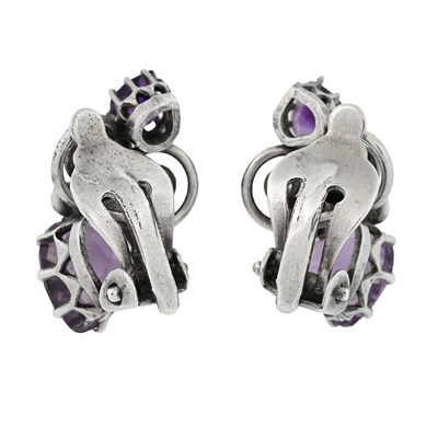 Lot 14 - A pair of Arts & Crafts silver amethyst and turquoise clip-on earrings