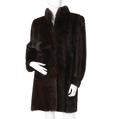 Lot 523 - Faulkes Furriers, a knee-length dark ranch mink coat.