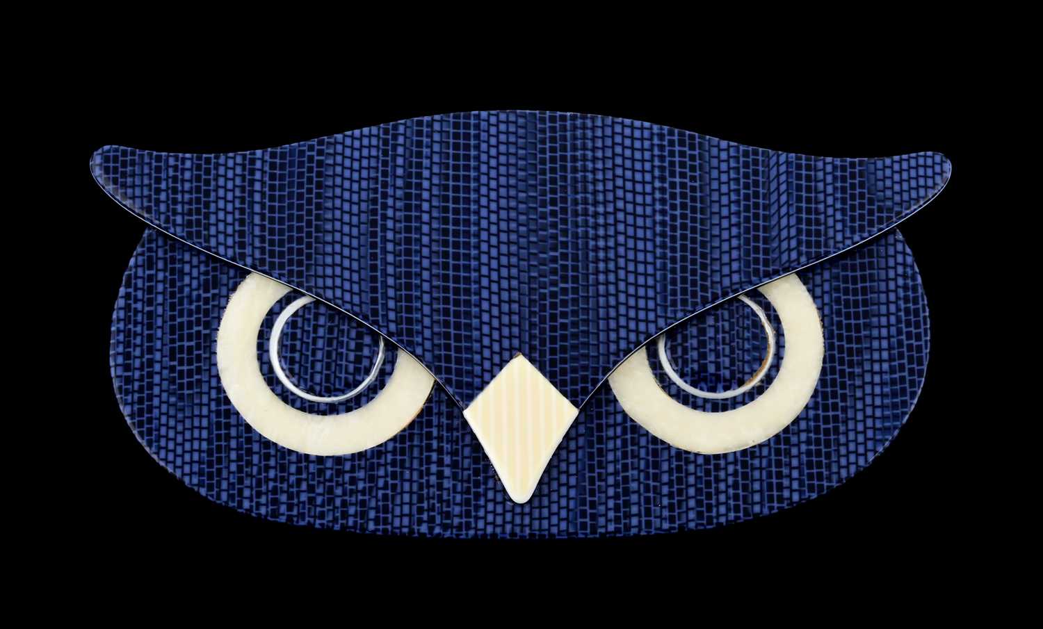 Lot 90 - Lea Stein, a celluloid owl head brooch, c. 1990