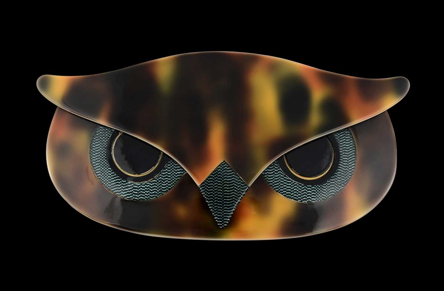Lot 91 - Lea Stein, a celluloid owl head brooch, c. 1990