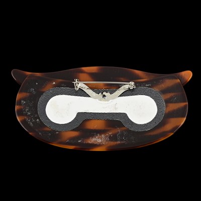 Lot 91 - Lea Stein, a celluloid owl head brooch, c. 1990