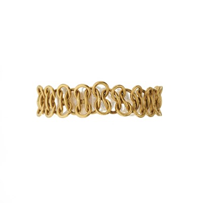 Lot 151 - A fancy-link chain bracelet, suspending a heart charm