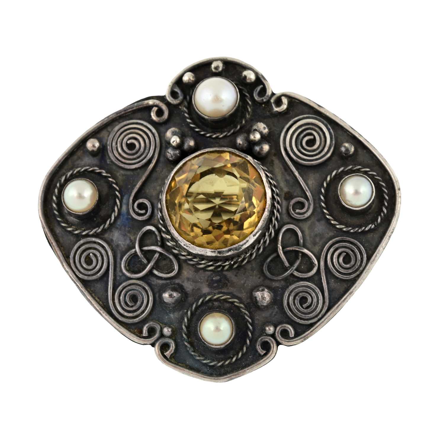 Lot 9 - An Arts & Crafts silver citrine and split pearl brooch, attributed to W. T. Blackband