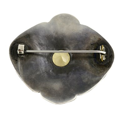 Lot 9 - An Arts & Crafts silver citrine and split pearl brooch, attributed to W. T. Blackband