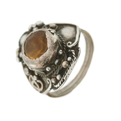 Lot 32 - An Arts & Crafts silver citrine ring