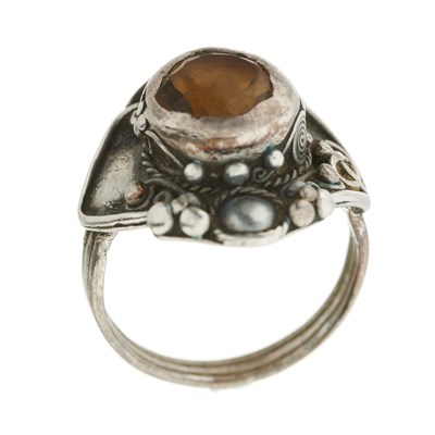 Lot 32 - An Arts & Crafts silver citrine ring