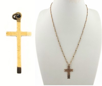 Lot 520 - Two 9ct gold cross pendants and a 9ct gold chain necklace, one by Georg Jensen Ltd.