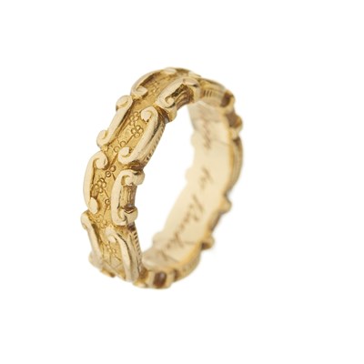 Lot 13 - A late 19th century 18ct gold scrolling band ring, signed Tiffany & Co.