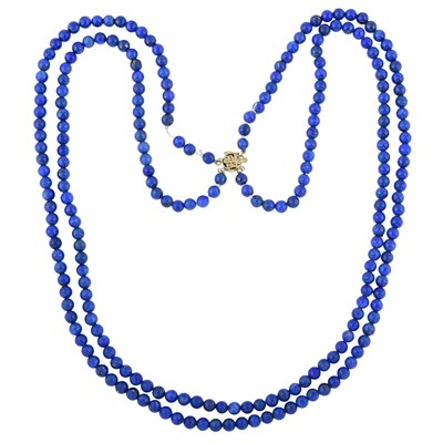 Lot 452 - A lapis lazuli bead two-row necklace, with Chinese character clasp