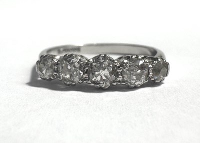 Lot 341 - A platinum graduated old-cut diamond five stone ring