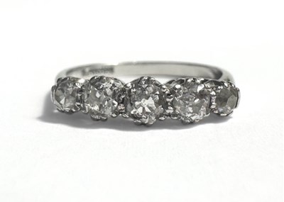 Lot 341 - A platinum graduated old-cut diamond five stone ring