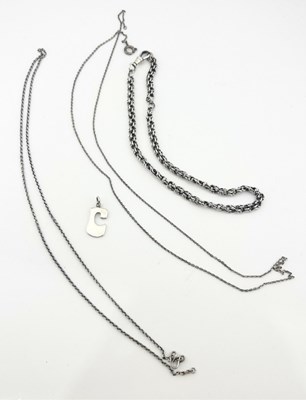 Lot 400 - Three white metal chain necklaces and a pendant