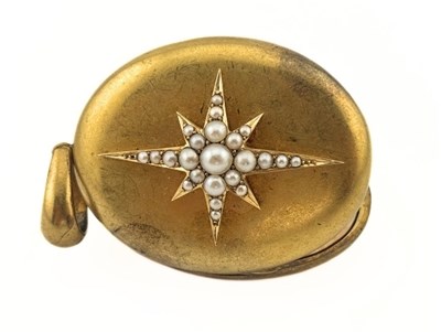 Lot 466 - A late Victorian pinchbeck split pearl cross locket pendant