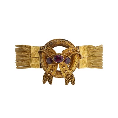 Lot 53 - A late Victorian gold garnet bracelet
