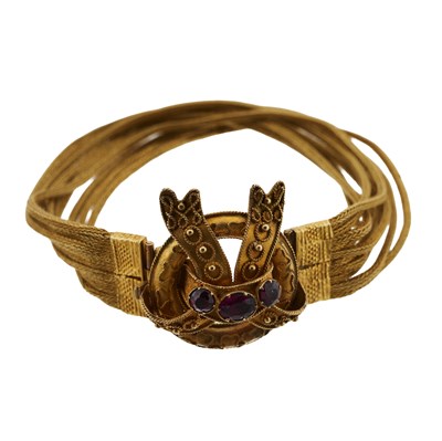 Lot 53 - A late Victorian gold garnet bracelet