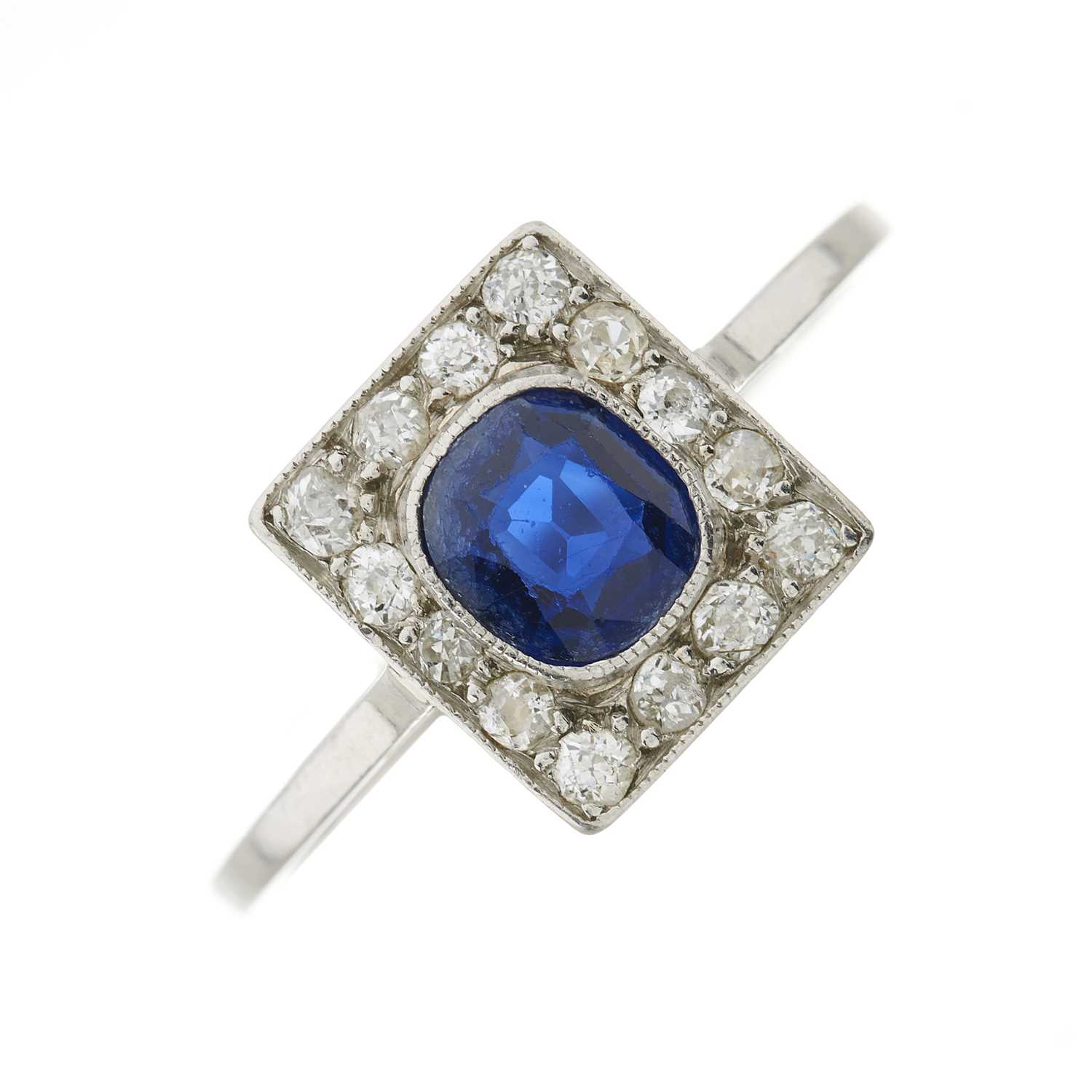 Lot 54 - An early 20th century platinum sapphire and old-cut diamond cluster ring