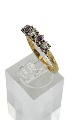Lot 479 - An 18ct gold ruby and brilliant-cut diamond five stone ring