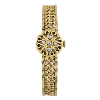 Lot 275 - Bucherer, a yellow metal bracelet watch