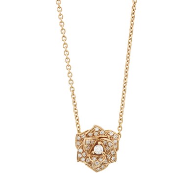 Lot 135 - Piaget, a brilliant-cut diamond rose pendant, on an integral chain