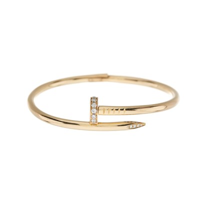 Lot 204 - Cartier, a Juste un Clou pave-set brilliant-cut diamond bangle