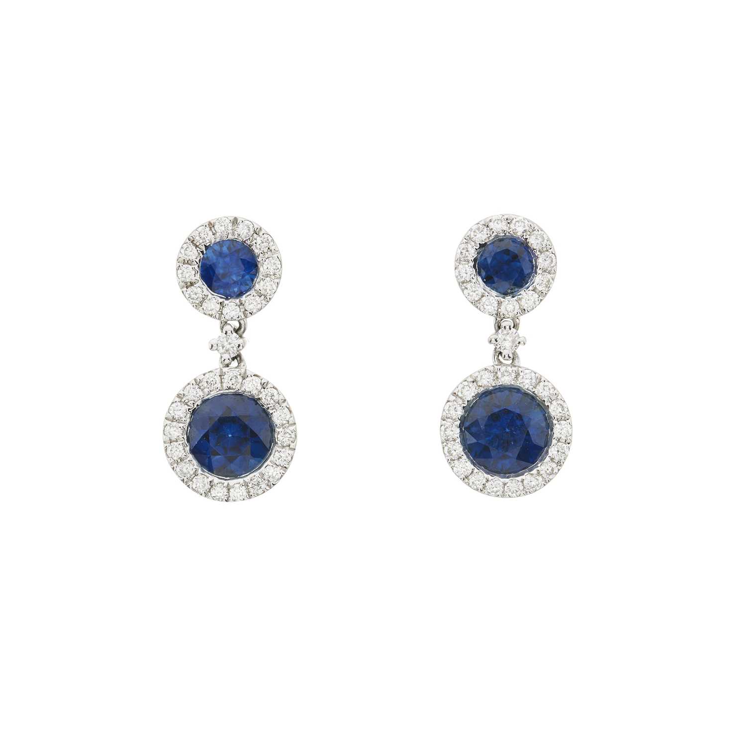 Lot 98 - An 18ct gold sapphire and brilliant-cut diamond cluster pendant and chain, with matching earrings