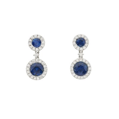 Lot 98 - An 18ct gold sapphire and brilliant-cut diamond cluster pendant and chain, with matching earrings
