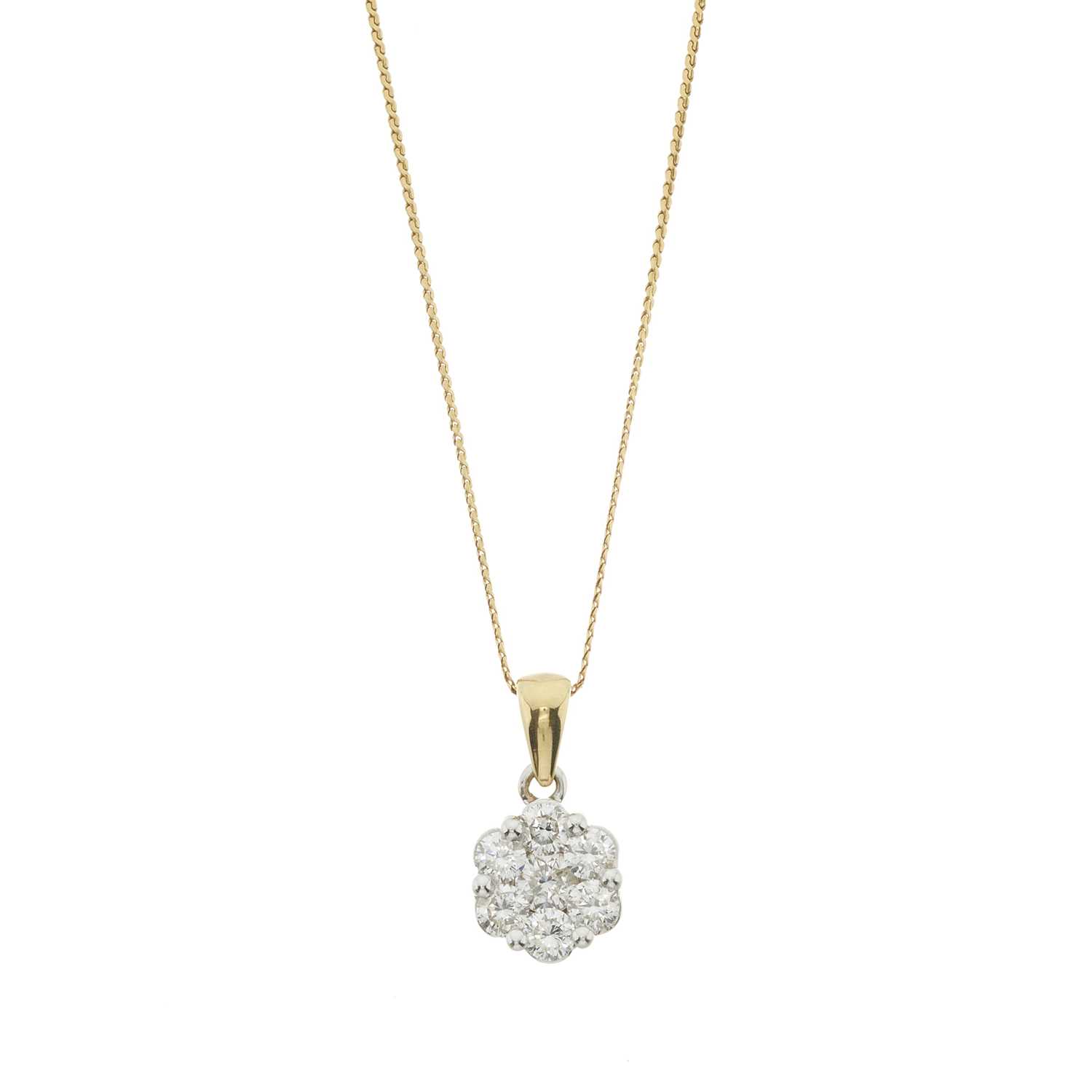 Lot 102 - A brilliant-cut diamond cluster pendant and chain