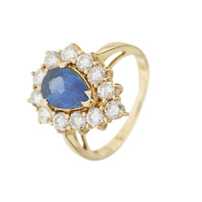 Lot 97 - A pear-shape sapphire and brilliant-cut diamond cluster ring