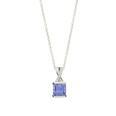 Lot 99 - A tanzanite and brilliant-cut diamond pendant and chain