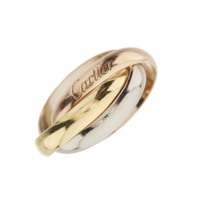 Lot 202 - Cartier, a tri-colour Trinity ring