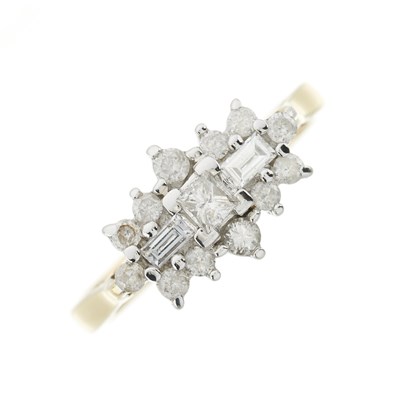 Lot 220 - An 18ct gold brilliant, princess and baguette-cut diamond cluster ring