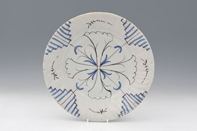Lot 773 - An English Delft blue and white and magenta...