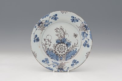 Lot 774 - An English Delft magenta, blue and white...