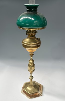 Lot 188 - A late 19th century oil lamp with clear...