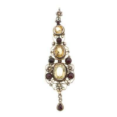 Lot 34 - An Arts & Crafts gold and silver citrine and garnet scrolling floral pendant