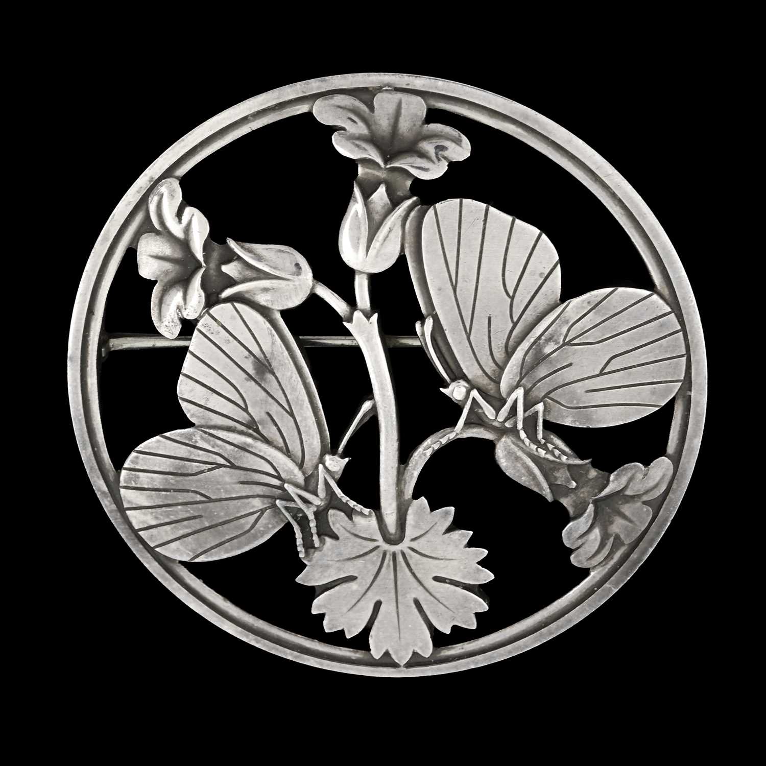 Lot 70 - Georg Jensen, by Arno Malinowski, a 1940s butterfly and floral circular brooch