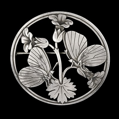 Lot 70 - Georg Jensen, by Arno Malinowski, a 1940s butterfly and floral circular brooch